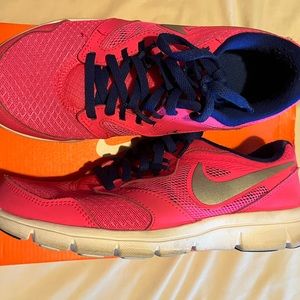 Hot pink Nike sneakers